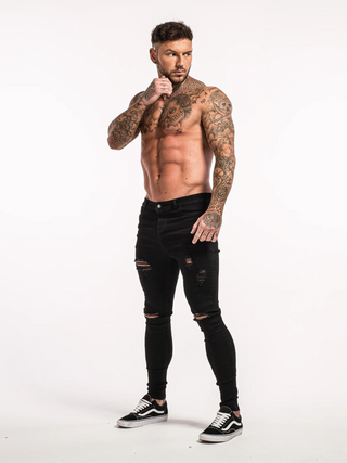 Jeans clásico negro rasgado